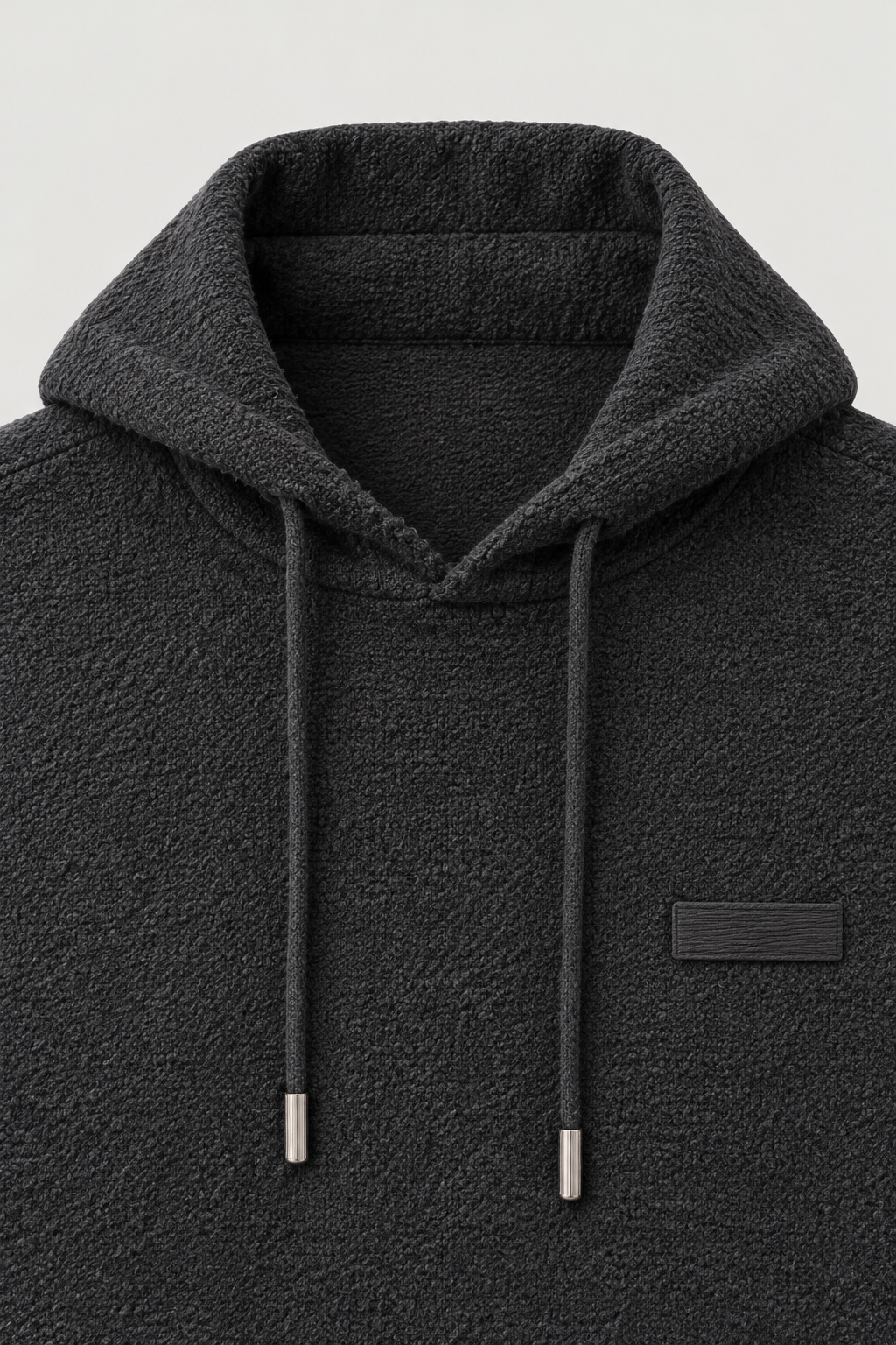 Sweat à capuche en maille texturée noir, détail de la capuche