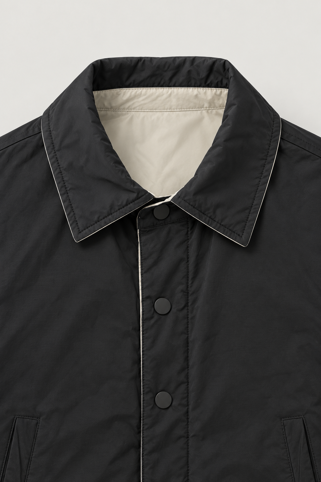 Veste réversible à pressions