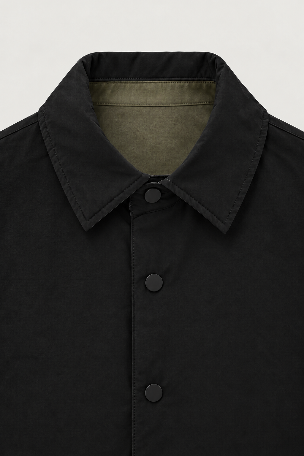 Veste réversible à pressions