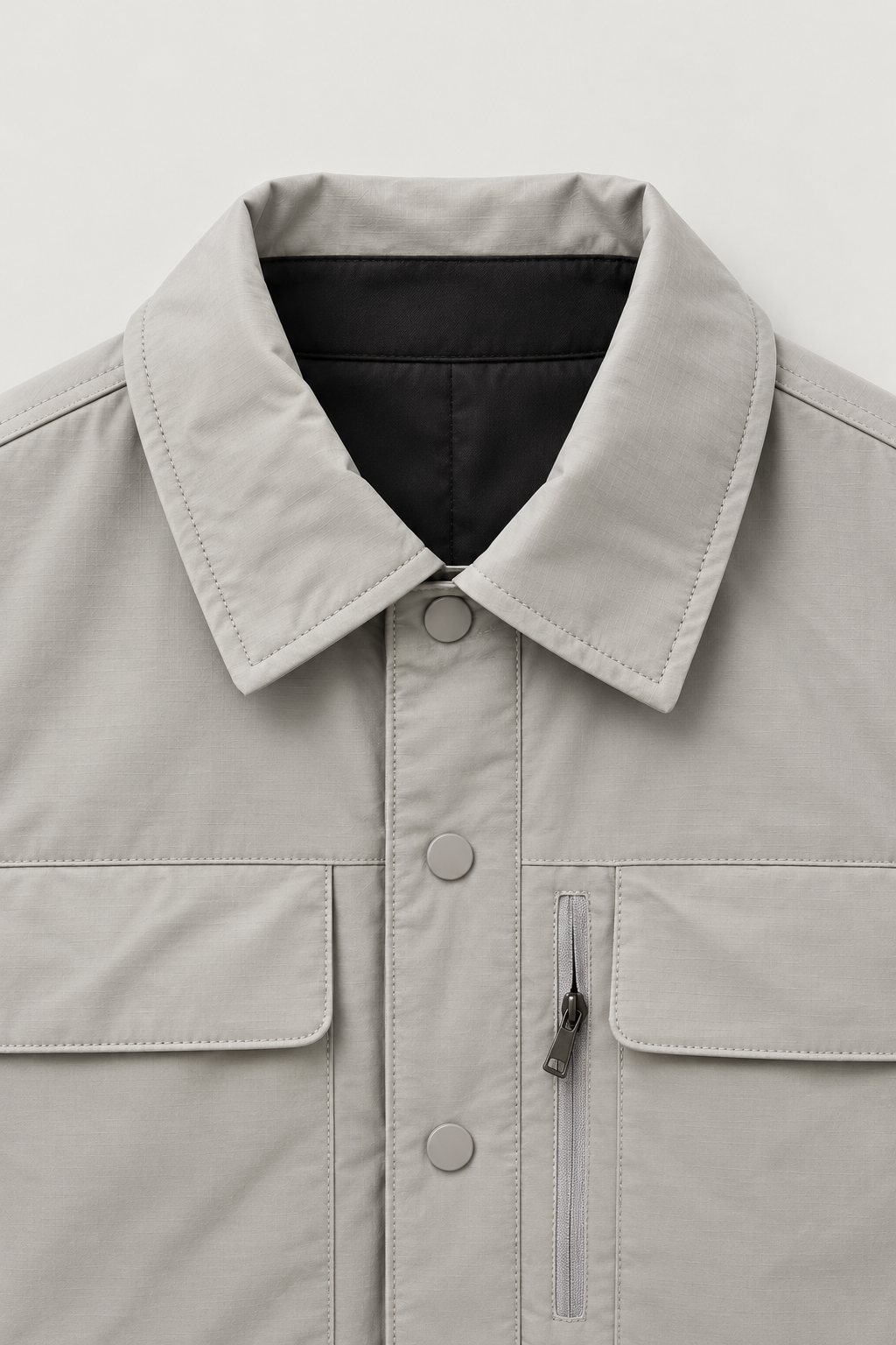 Veste réversible à pressions